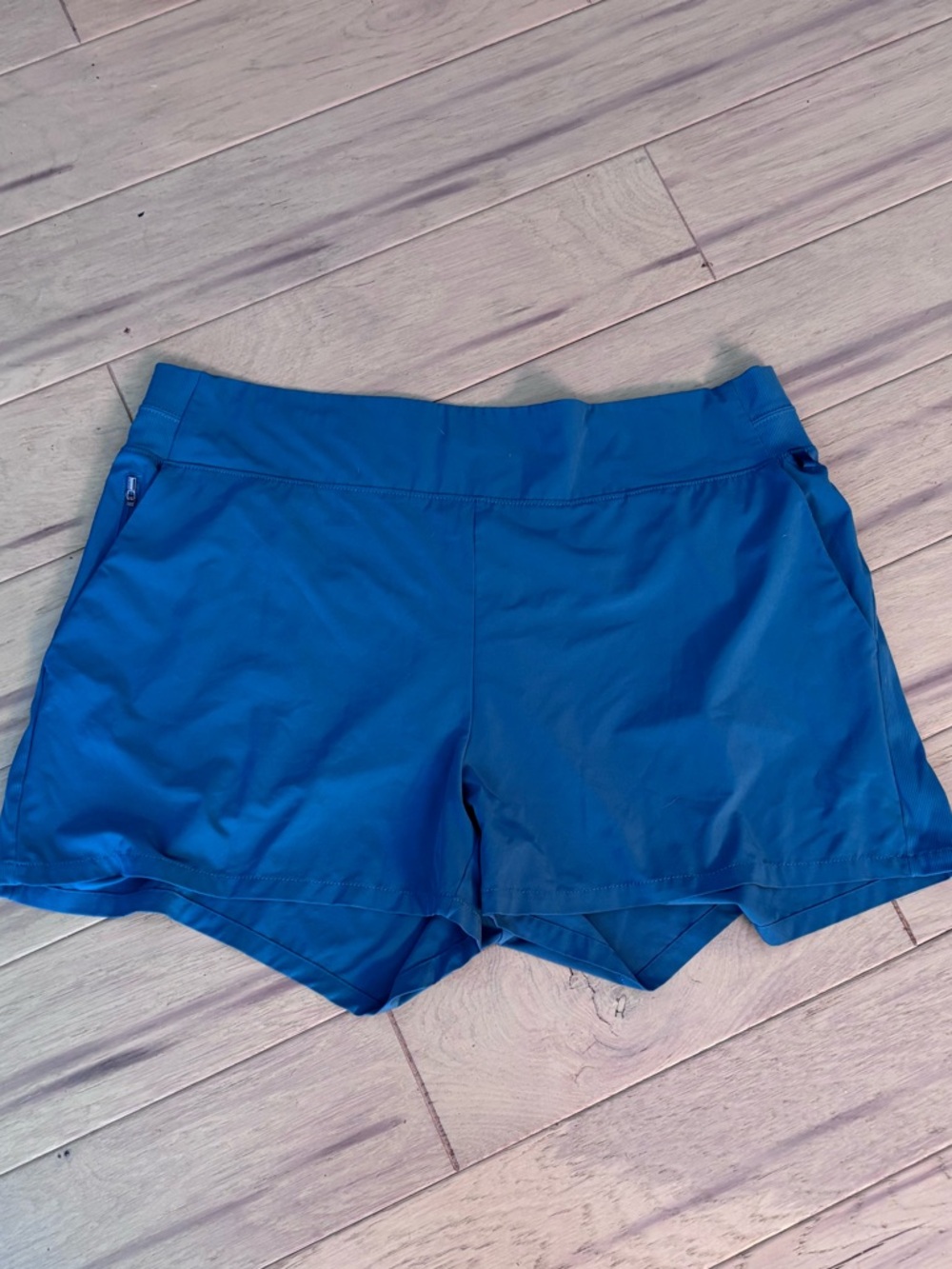 Athleta workout shorts - teal color.  Size 18, fits like an XXL.